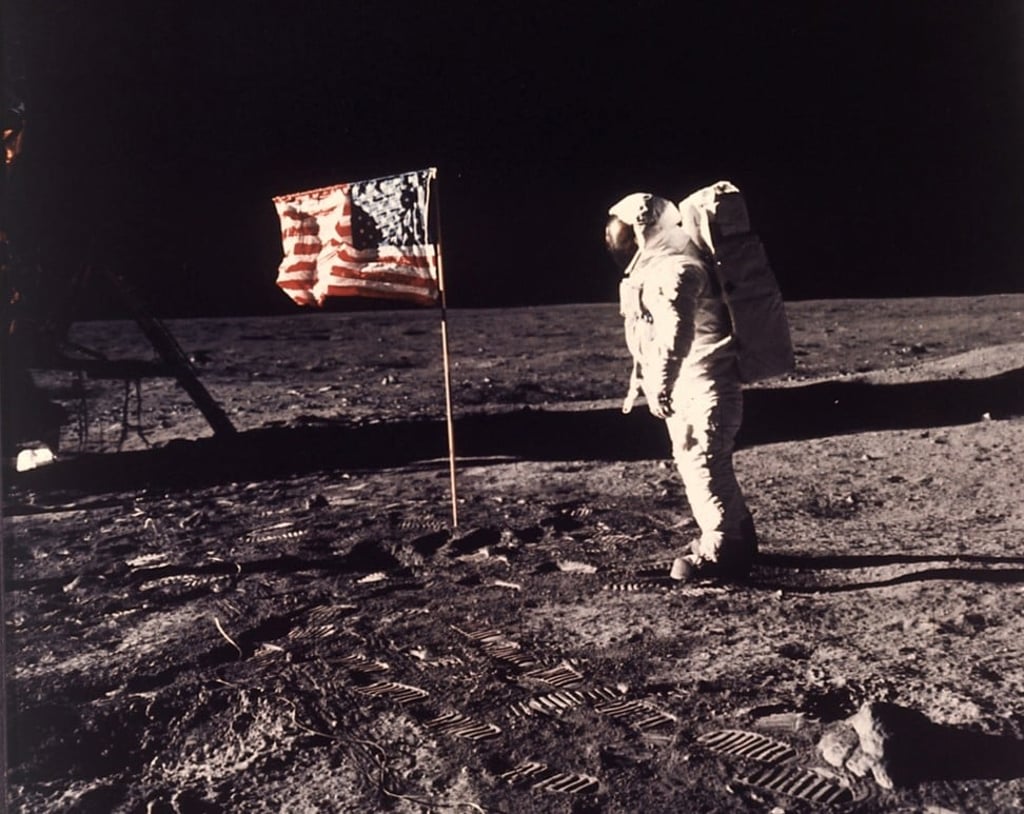 American astronaut Buzz Aldrin beside the US flag deployed on the moon during the Apollo 11 mission on July 20, 1969. Photo: Nasa via AP
