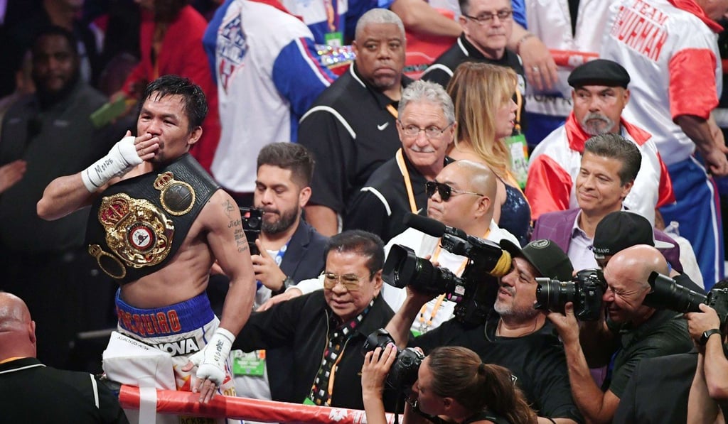 Manny Pacquiao is a world champions again after a convincing win over Keith Thurman. Photo: AFP Manny Pacquiao is a world champions again after a convincing win over Keith Thurman. Photo: AFP