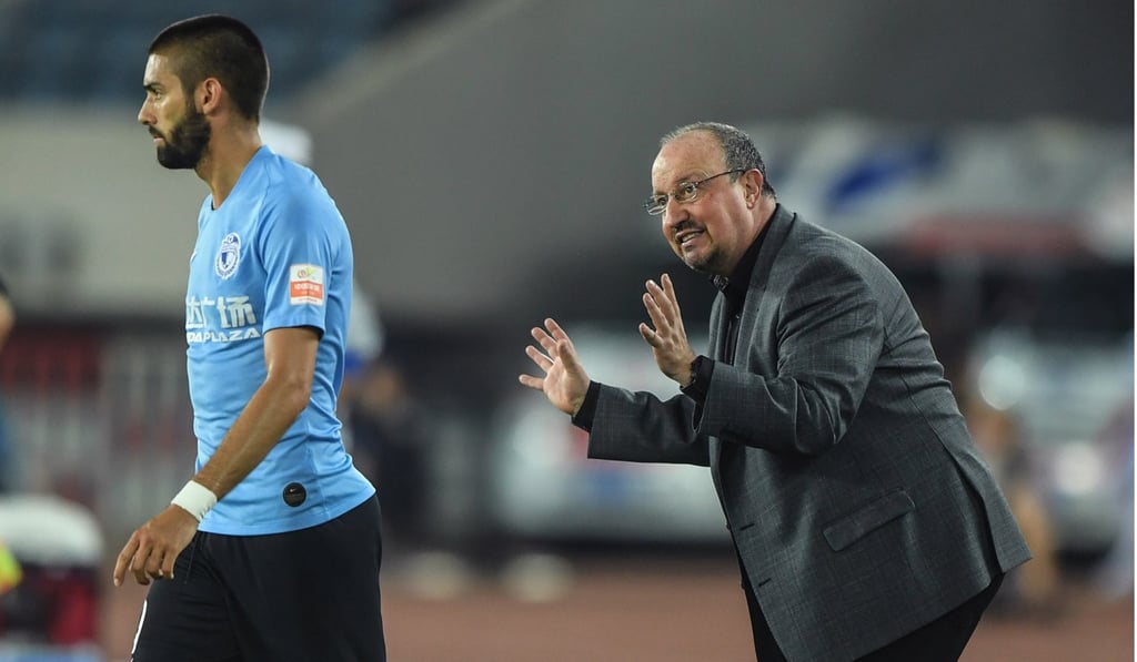 Rafa Benitez (right) is on a reported £12 million a year as head coach of Dalian Yifang. Photo: Xinhua Rafa Benitez (right) is on a reported £12 million a year as head coach of Dalian Yifang. Photo: Xinhua