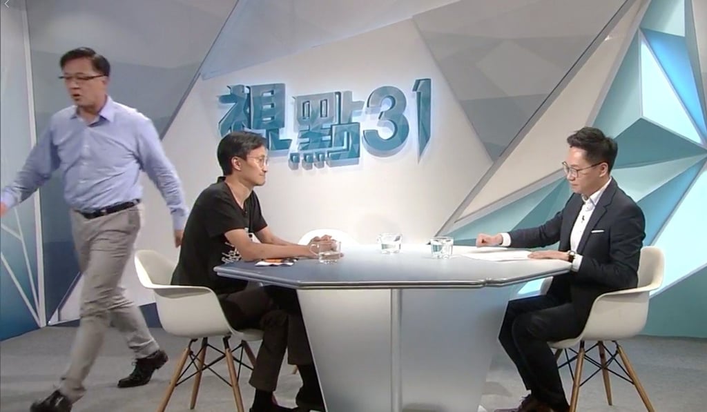 Junius Ho storms off the set of the television show he was appearing on alongside Eddie Chu. Photo: RTHK Junius Ho storms off the set of the television show he was appearing on alongside Eddie Chu. Photo: RTHK