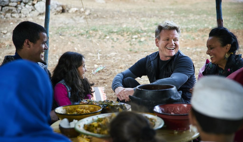 Gordon Ramsay and Moroccan chef Najat Kaanache (right) celebrate with locals during a feast for the Berber New Year. Photo: Mark Johnson/National Geographic