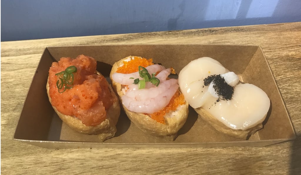Bean curd sushi with scallop and black truffle (right) was the favourite dish. Photo: Fifi Tsui