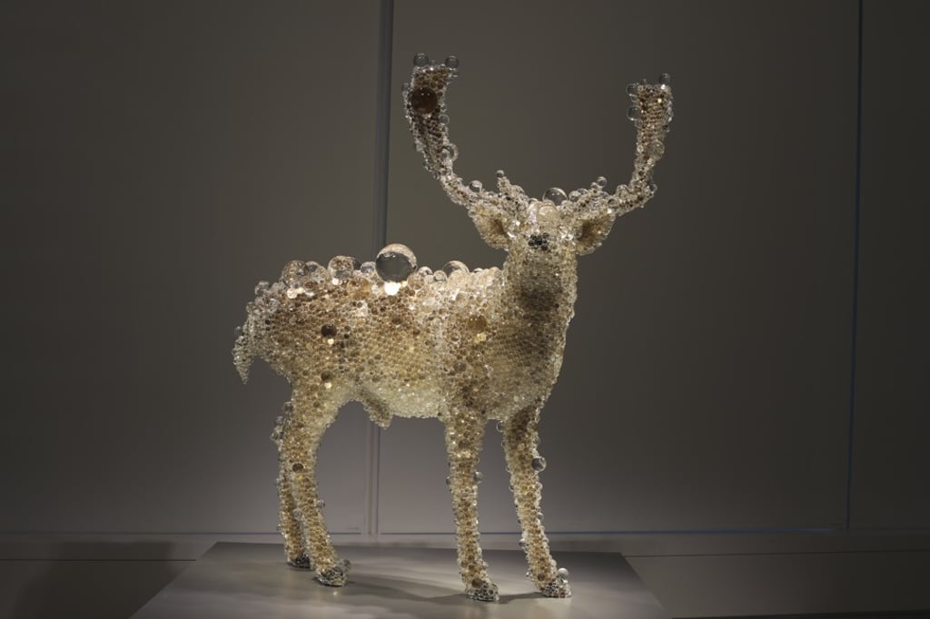 A stuffed deer encrusted in glass bubbles from Kohei Nawa's “Pixcell” series on show at his Recent Works exhibition at Pace Gallery in Central, Hong Kong. The Japanese artists says the series is his take on society’s obsession with viewing the world in pixelated form through smartphones, digital cameras and online. Photo: Xiaomei Chen