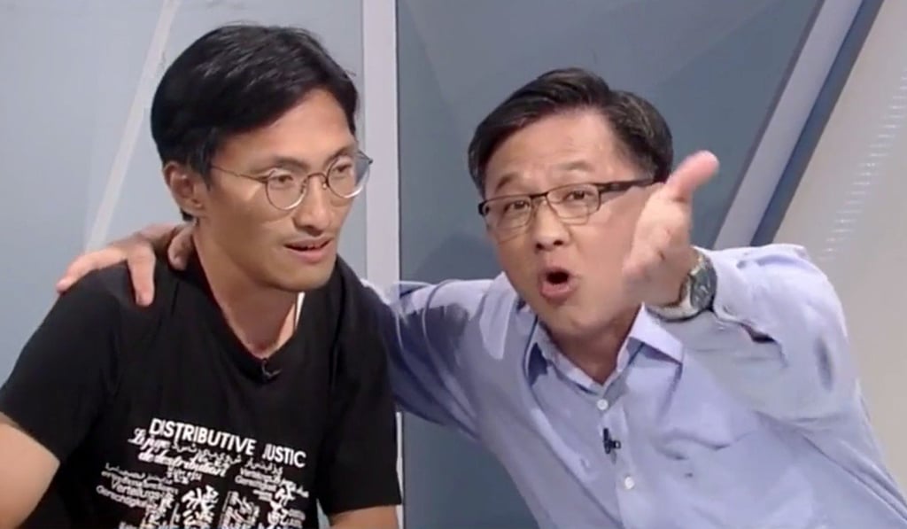 Junius Ho (right) made repeated and aggressive demands that Eddie Chu call for a halt to protests during a live television show on Tuesday. Photo: RTHK Junius Ho (right) made repeated and aggressive demands that Eddie Chu call for a halt to protests during a live television show on Tuesday. Photo: RTHK