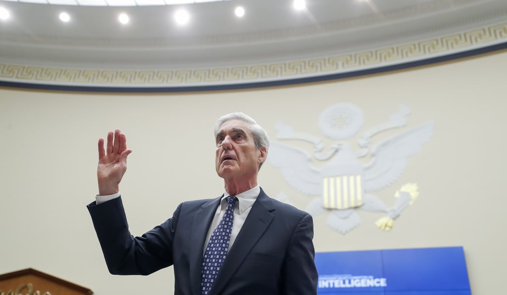 Robert Mueller being sworn in before the House Intelligence Committee. Photo: EPA