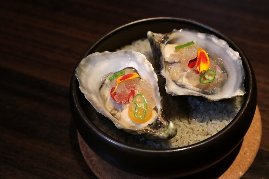 David Herbe boudeuse oysters with spiced tomato granita. Photo: Edmond So