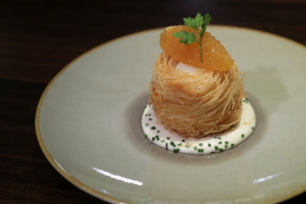 Kadafi-fried taiyouran egg with sour cream and smoked pike perch roe. Photo: Edmond So