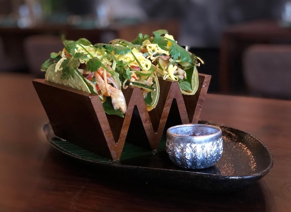 Som Chai's crispy tacos are a crowd-pleaser that do not disappoint. The restaurant caters to hipster expats. Som Chai's crispy tacos are a crowd-pleaser that do not disappoint. The restaurant caters to hipster expats.