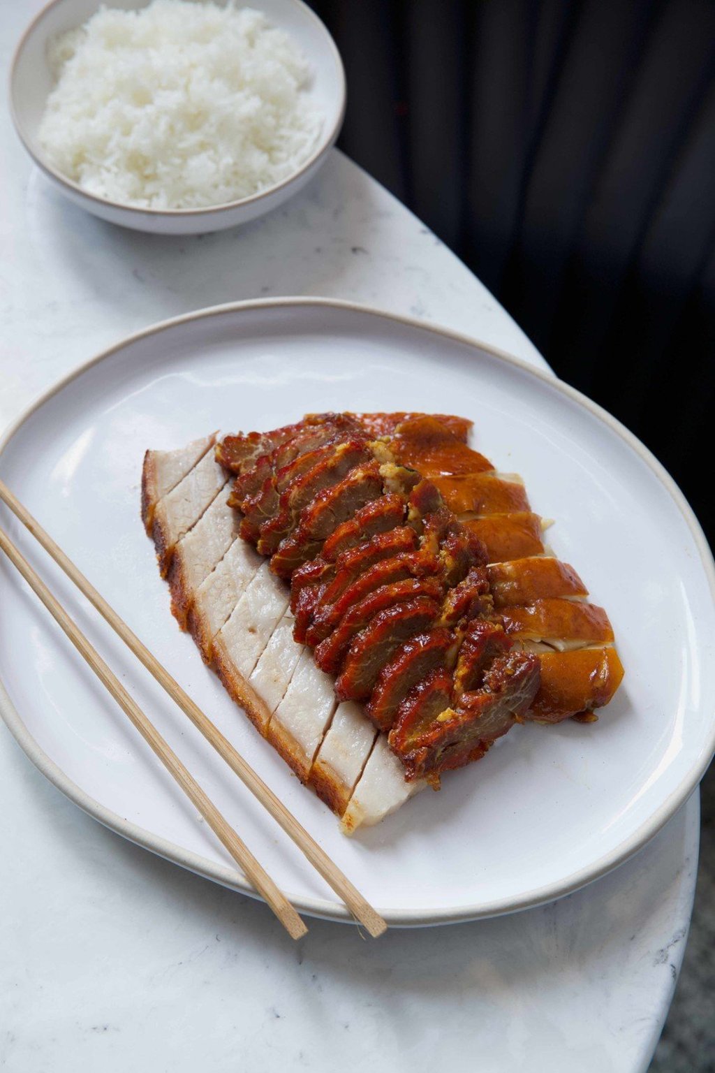 Kym’s Three Treasure: crispy pork belly, soy chicken and Iberico pork char siu. Kym’s Three Treasure: crispy pork belly, soy chicken and Iberico pork char siu.