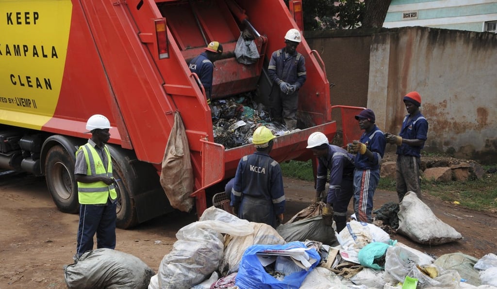 Kampala workers as part of the campaign to encourage people to keep their neighbourhood clean. Photo: AP