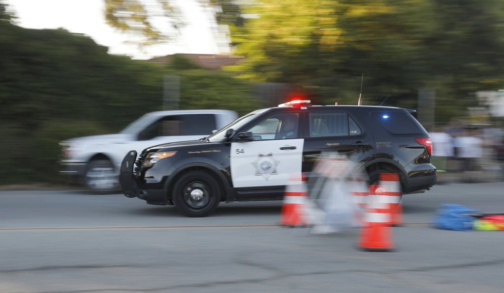 Emergency vehicles head towards the Gilroy Garlic Festival following the shooting. Photo: AP