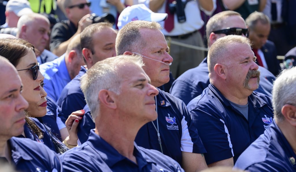 September 11 first responders at a signing ceremony in the Rose Garden of the White House on Monday. Photo: Bloomberg