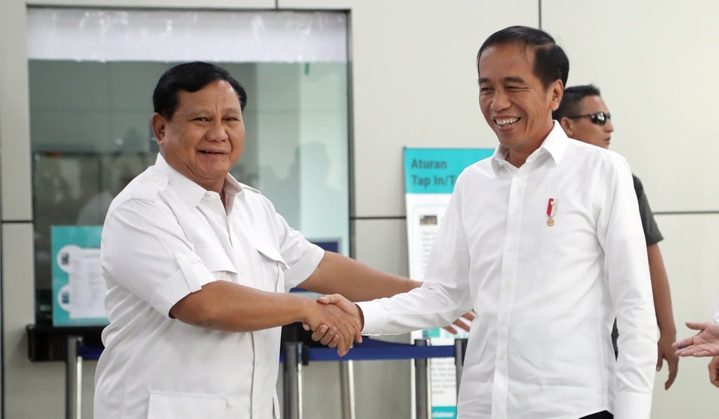 Prabowo Subianto (left) and Joko Widodo (right) have reconciled since their election battle in April. Photo: EPA