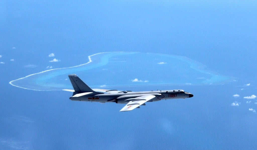 A Chinese bomber flies over Scarborough Shoal. Photo: Xinhua