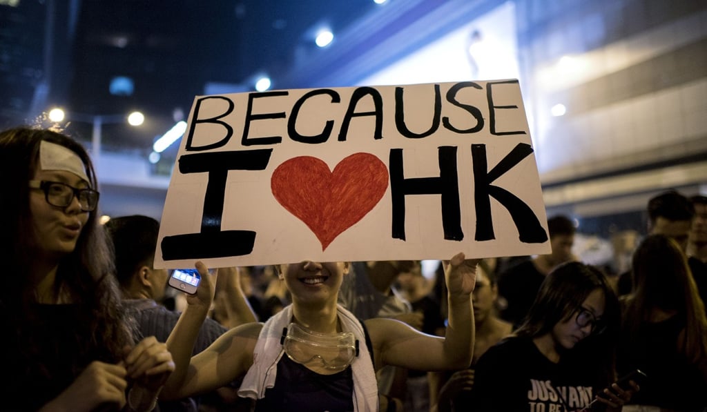 A placard spells out the mood at a large pro-democracy protest in Hong Kong on October 1, 2014. That was when Hong Kong was plunged into the worst political crisis since its 1997 handover, with protesters taking over the streets following Beijing’s refusal to grant full universal suffrage. Photo: AFP