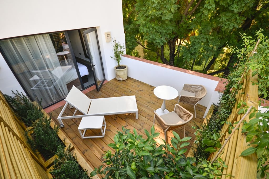 The hotel is the only one in Seville with rooms that overlook the gardens of the Real Alcázar palace. Photo: Legado Alcázar Hotel