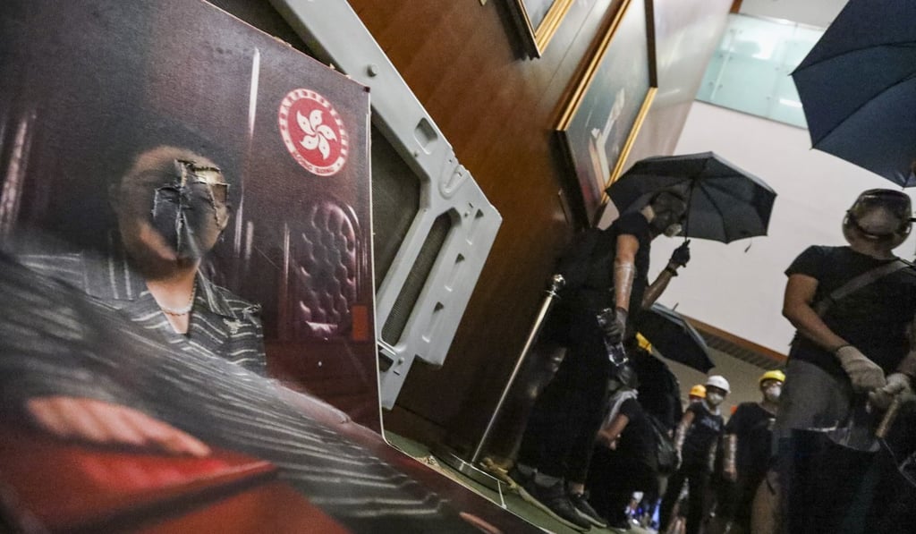 A portrait of Rita Fan Hsu Lai-tai, former Legislative Council president and ex-member of the National People’s Congress Standing Committee, lies defaced as protesters storm the Legco chamber in Admiralty during a protest against the extradition bill on July 1, the 22nd anniversary of Hong Kong’s handover. Photo: Felix Wong