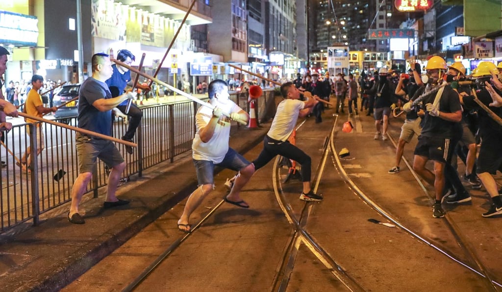 A gang of men attack protesters in North Point. Photo: Sam Tsang