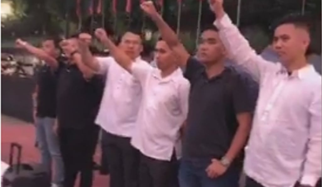 Cardema rose to fame by appearing at anti-Duterte rallies, where he and a few other crew-cut members of Duterte Youth would silently pose ramrod straight with their fists held out in a Hitler-like salute. Photo: Facebook Cardema rose to fame by appearing at anti-Duterte rallies, where he and a few other crew-cut members of Duterte Youth would silently pose ramrod straight with their fists held out in a Hitler-like salute. Photo: Facebook