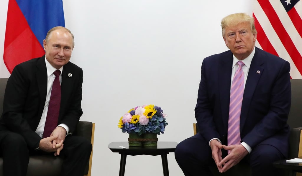 Russian President Vladimir Putin and US President Donald Trump at the G20 summit in Japan in June. Photo: EPA Russian President Vladimir Putin and US President Donald Trump at the G20 summit in Japan in June. Photo: EPA