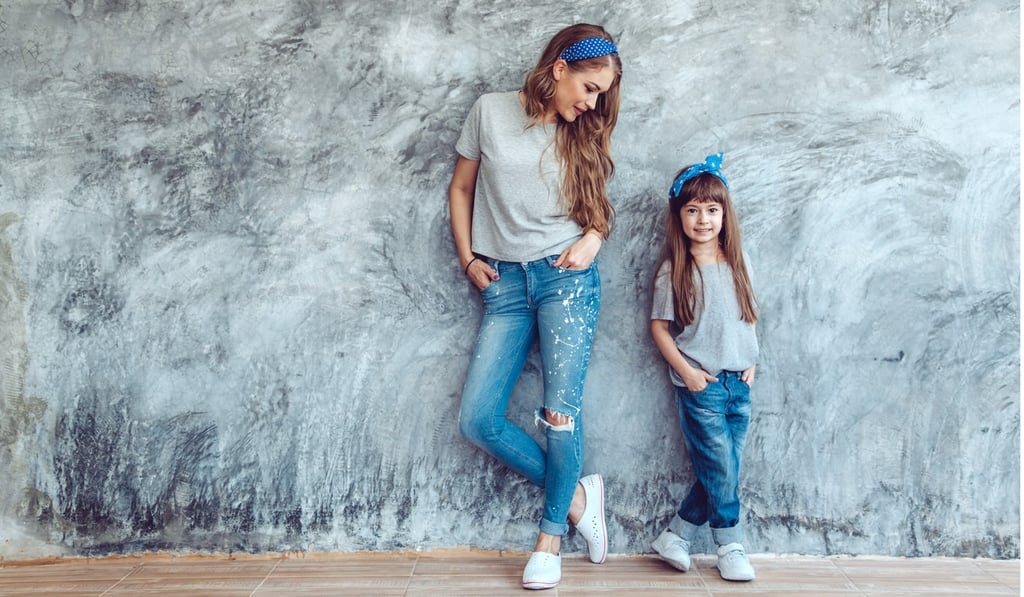 Jeans, T-shirts and chic trainers is one of several universally approved mum uniforms. Photo: Shutterstock Jeans, T-shirts and chic trainers is one of several universally approved mum uniforms. Photo: Shutterstock