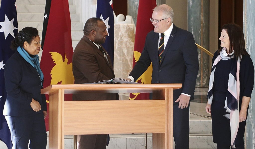 Papua New Guinea's Prime Minister James Marape meets Australian Prime Minister Scott Morrison. Photo: AP Papua New Guinea's Prime Minister James Marape meets Australian Prime Minister Scott Morrison. Photo: AP