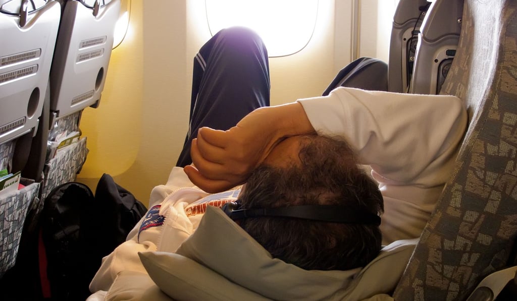 BBC4FF Sleeping passenger on a plane