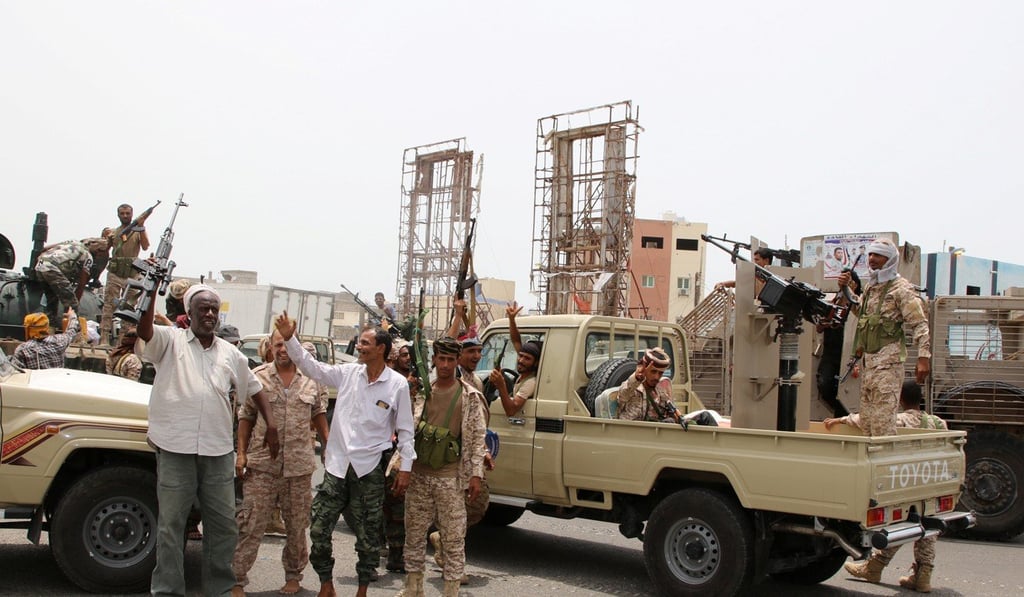 Members of UAE-backed southern Yemeni separatist forces patrol a road in Aden. Photo: Reuters