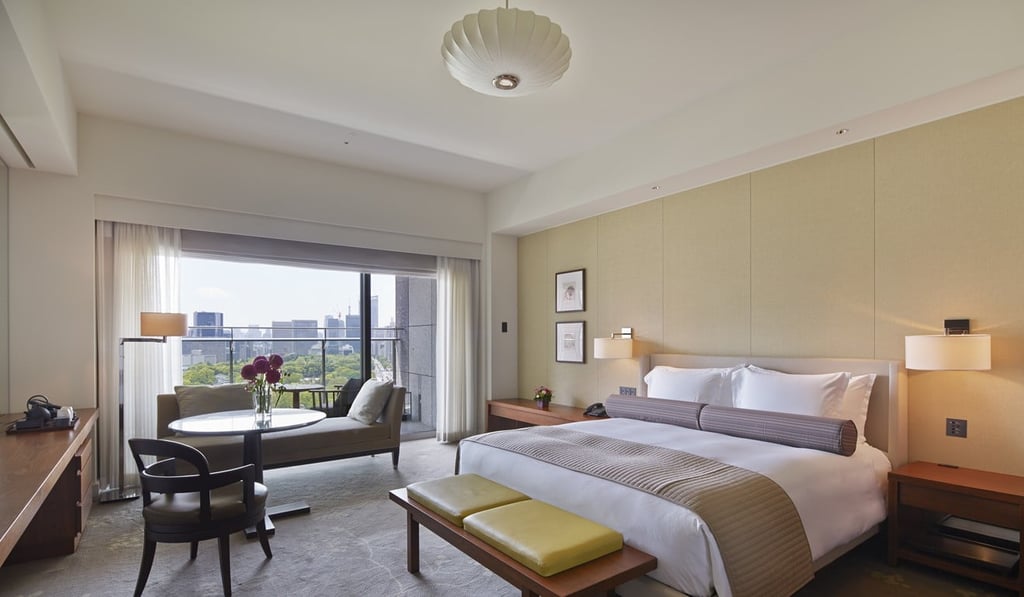 The sumptuous Palace Hotel Tokyo’s Deluxe King Room which also has a private balcony. The hotel’s 278 rooms and 12 suites boast luxury decor which blend leafy carpet motifs and earthy colours.