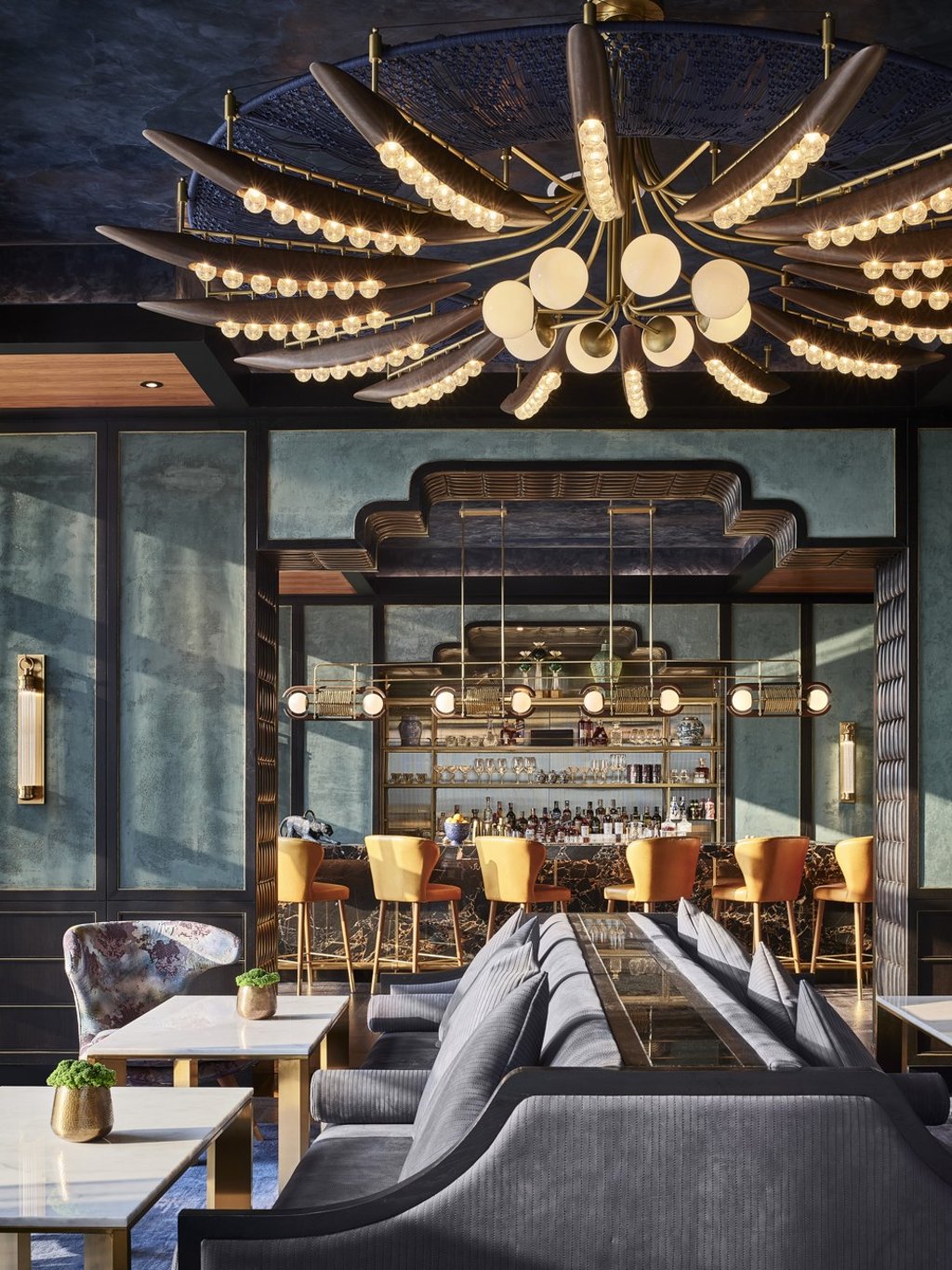 The bar area inside Nan Bei restaurant features pops of jewel-tone colours as part of its art deco design.