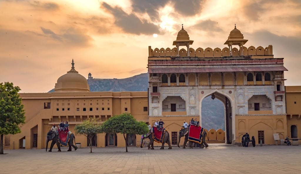 Tourists enjoy elephant rides at the Amber Fort. Photo: Alamy Tourists enjoy elephant rides at the Amber Fort. Photo: Alamy