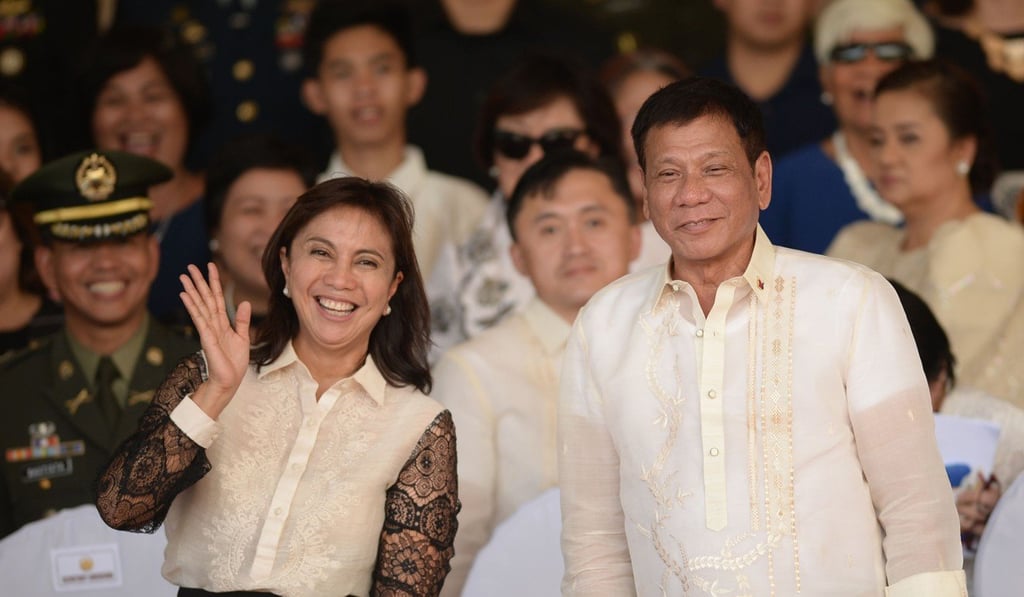 Vice-President Leni Robredo with President Rodrigo Duterte. Photo: AFP