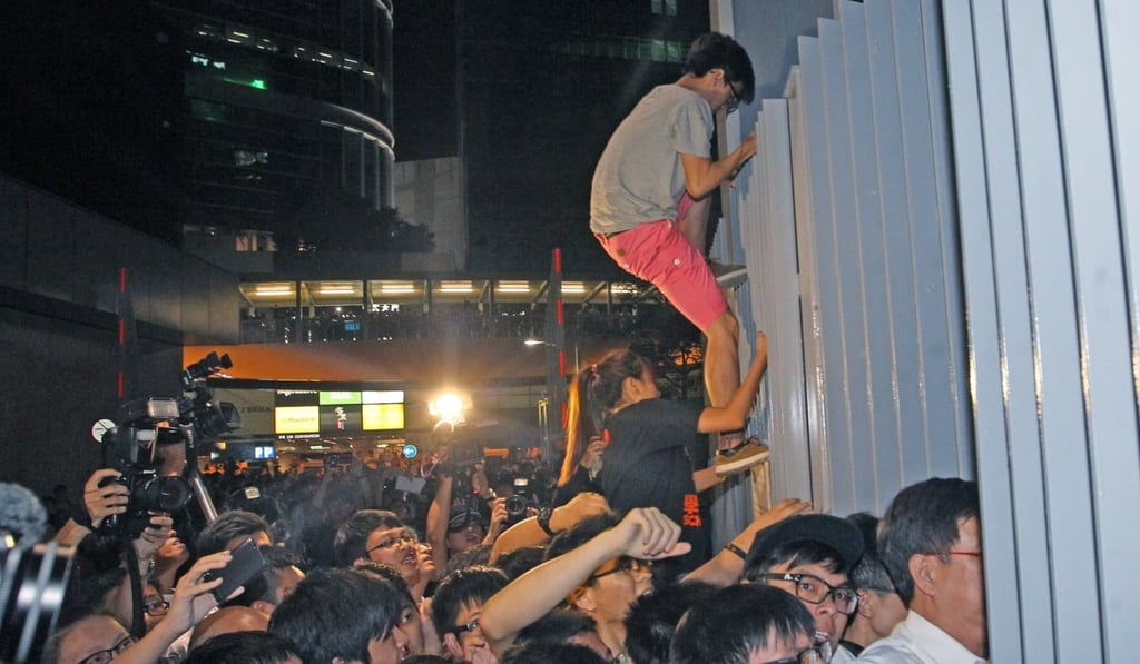 Around 100 Occupy protesters broke into the area outside government headquarters in 2014. Photo: SCMP.