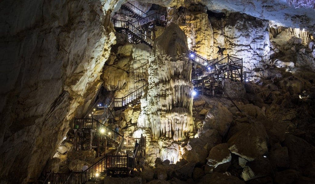 Visitors walk on the stairway to the entrance/exit point of Paradise Cave in Phong Nha-Ke Bang National Park, Vietnam. Photo: Alamy