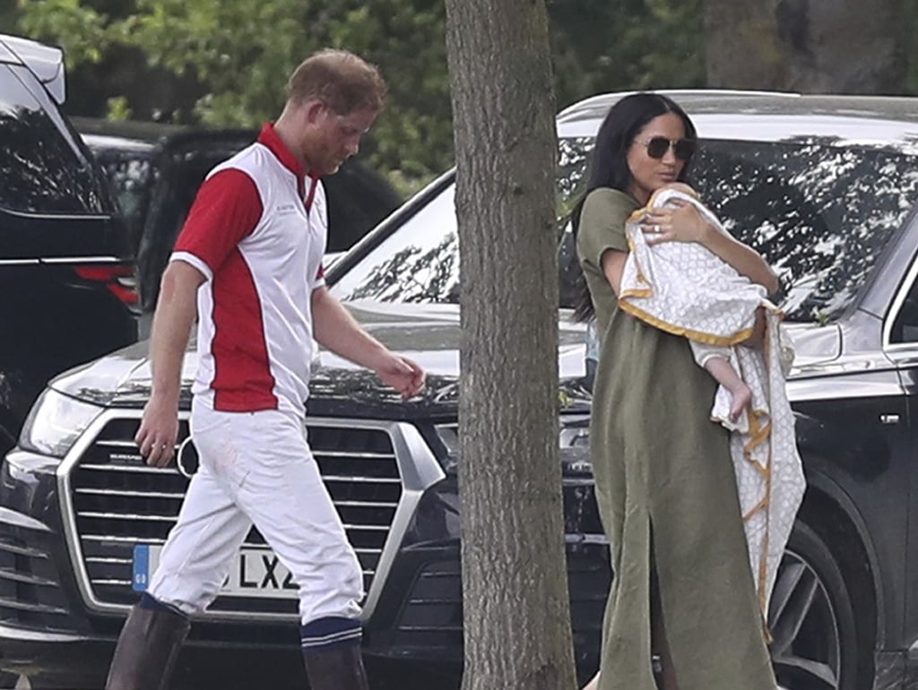 Britain's Prince Harry and Meghan, Duchess of Sussex, with their son Archie wrapped in a Malabar Baby quilt, at Billingbear Polo Club, in England, on July 10. Photo: AP
