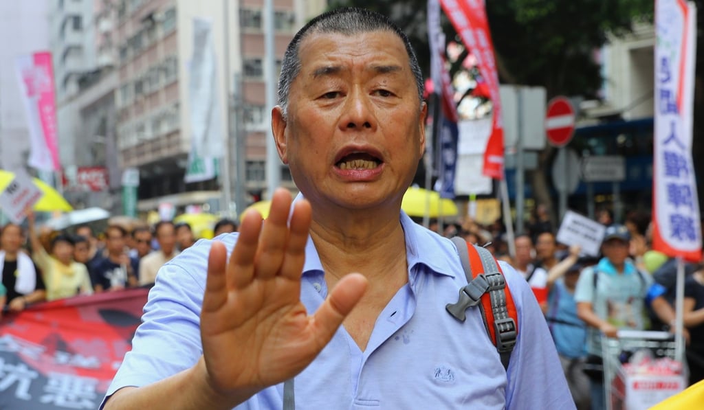 Tycoon Jimmy Lai was photographed on a plane. Photo: Edmond So Tycoon Jimmy Lai was photographed on a plane. Photo: Edmond So