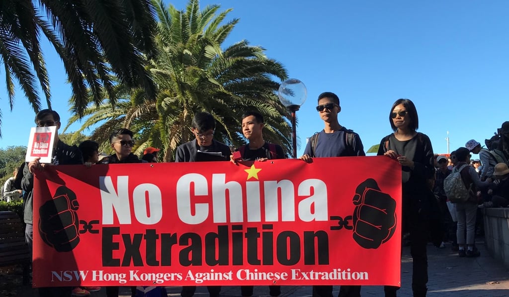 Protesters at the State Library in Sydney, Australia, protest against Hong Kong’s (now withdrawn) extradition bill. Photo: Reuters