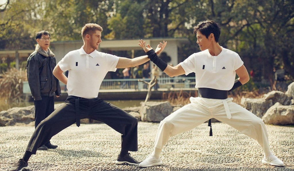 Ash Dykes and Jacky Heung pose for their Jet Li product photo shoot. Photo: Handout