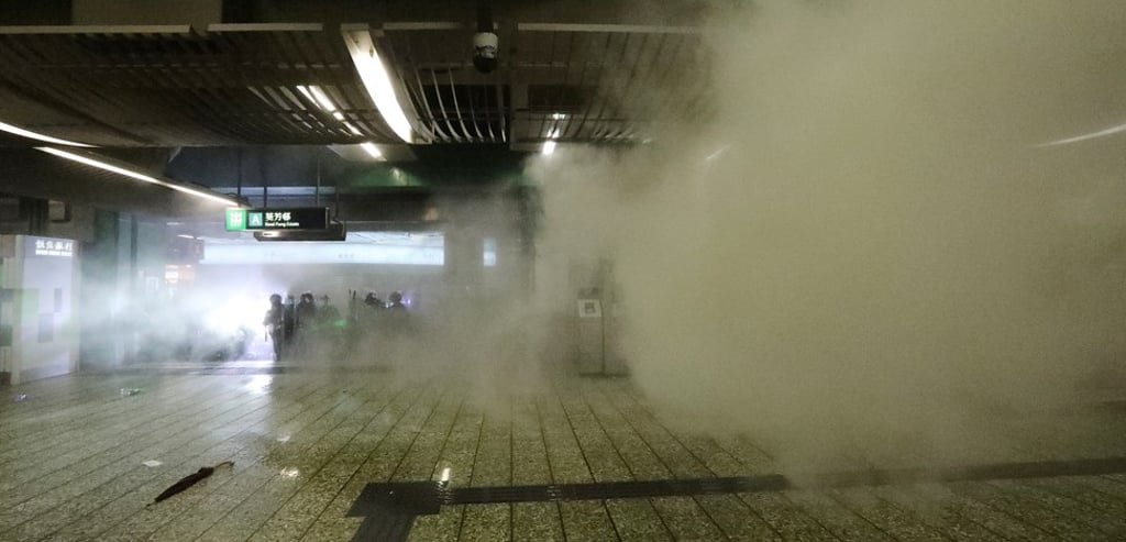 Tear gas is deployed inside Kwai Fong MTR station on August 11. Photo: Felix Wong