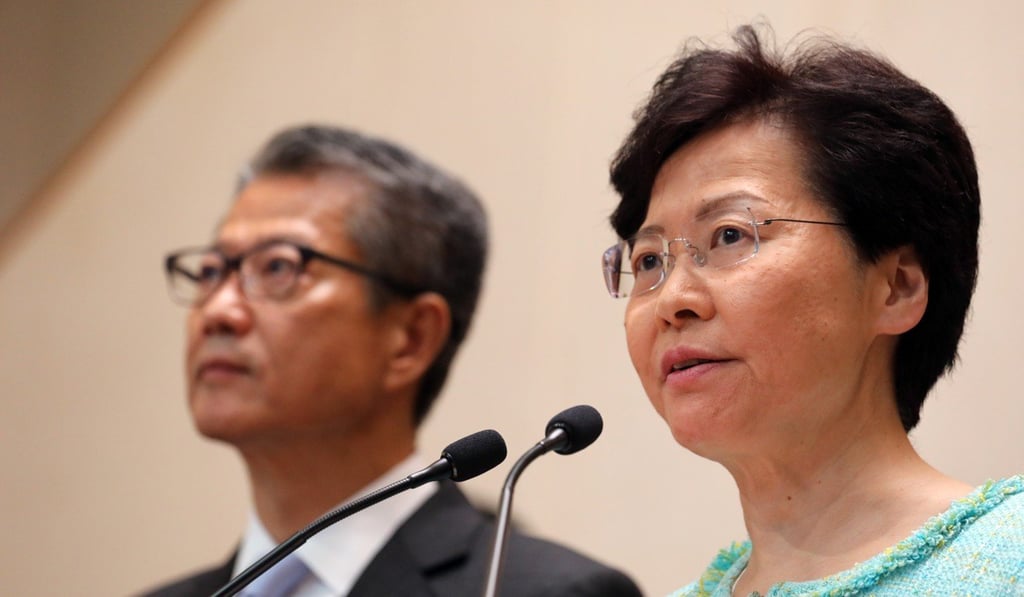 Hong Kong’s Financial Secretary Paul Chan Mo-po and Chief Executive Carrie Lam Cheng Yuet-ngor appear to be in the mood for “handing out candies”. Photo: Felix Wong