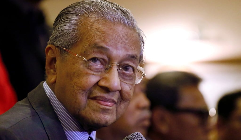 Mahathir pressed home that the government would not tolerate Naik’s attempt to ‘participate in racial politics’. Photo: Reuters