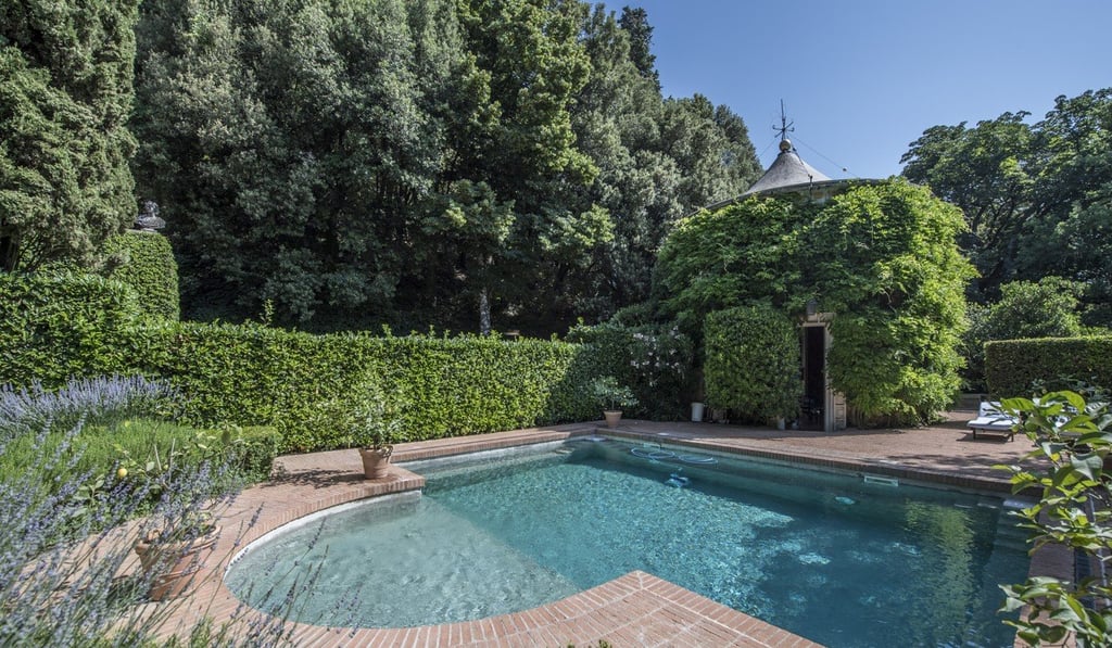 The swimming pool in the garden of the Tuscany summer home of Italian fashion designer Valentino Garavani and his lifetime partner businessman Giancarlo Giammetti, which is for sale for US$13 million.