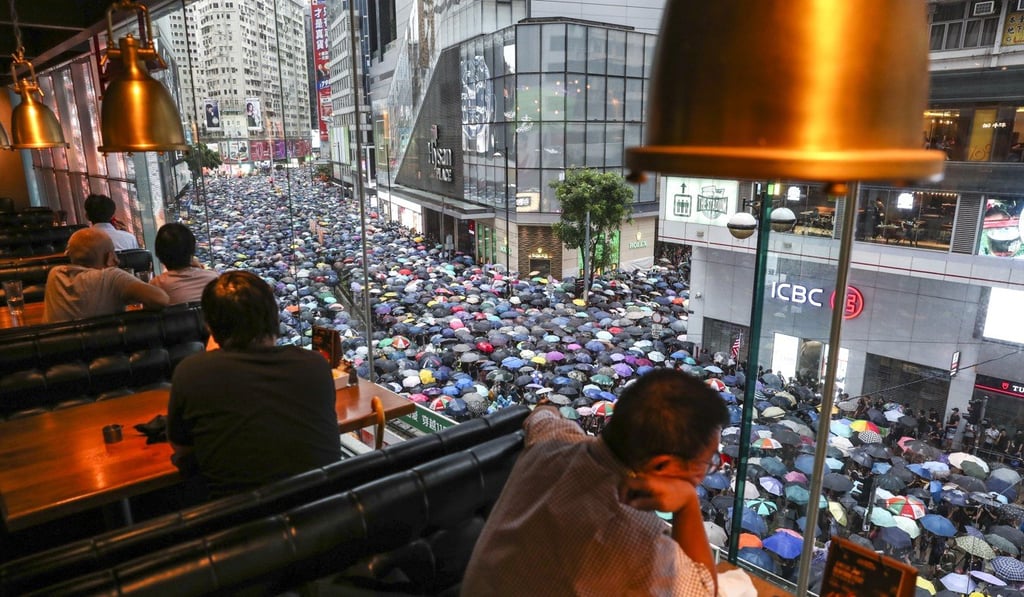 An estimated 1.7 million people took to the streets of Hong Kong on Sunday. Photo: Robert Ng