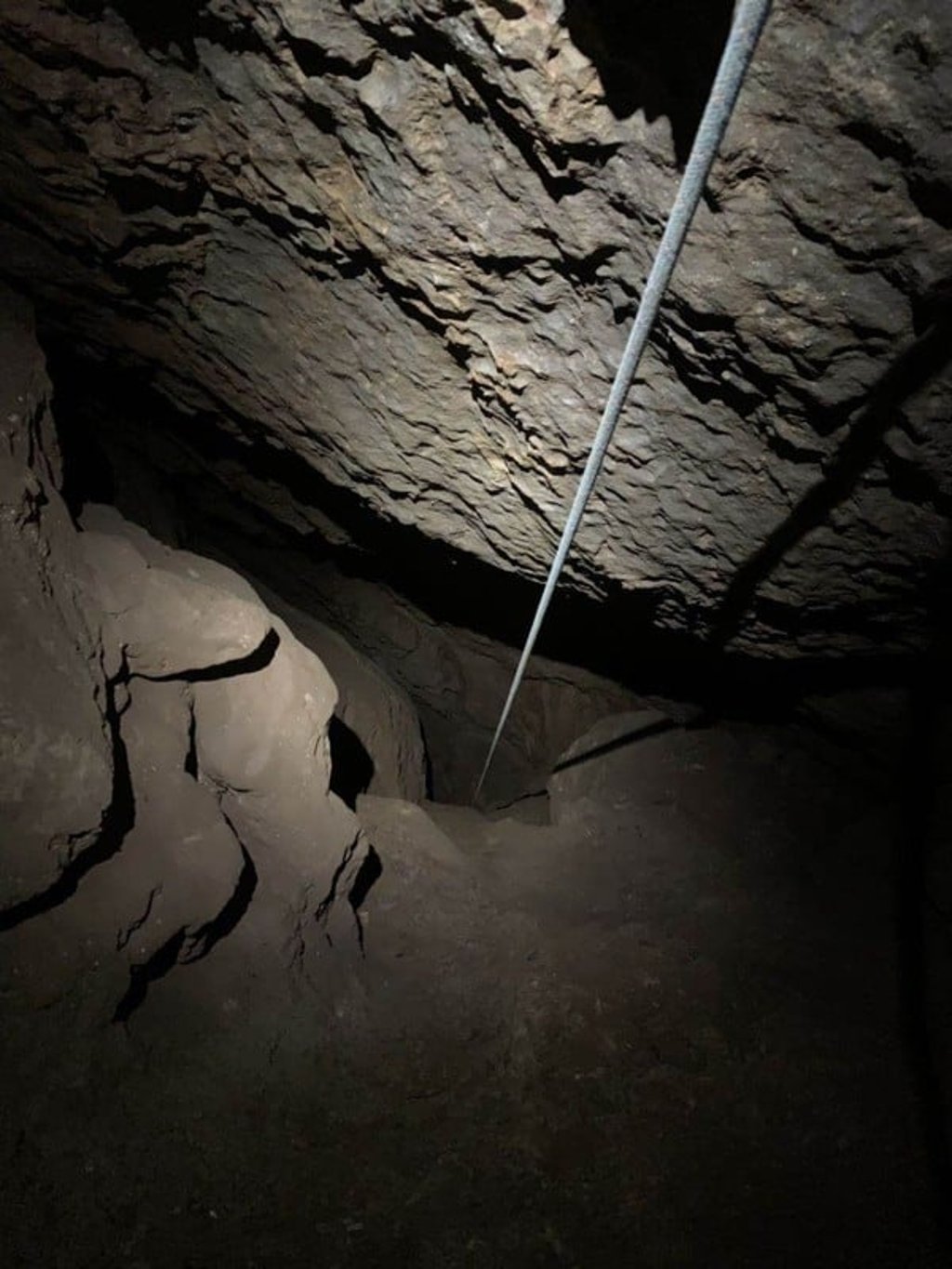 The descent into the cave by rope is not for the faint-hearted. Photo: Pavel Toropov