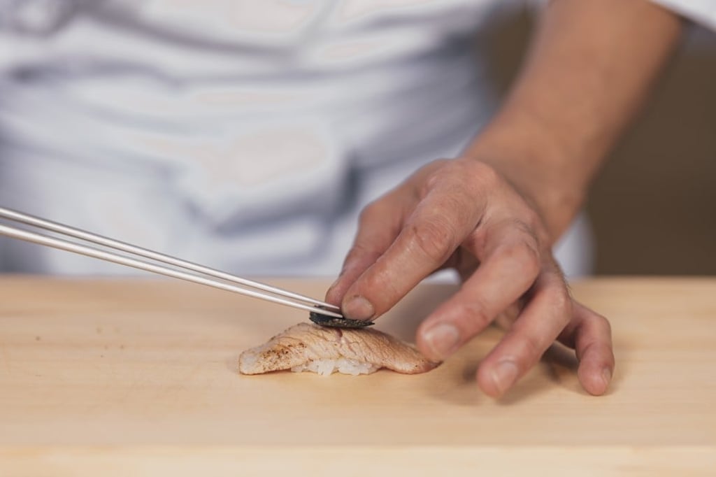 Lightly seared otoro with a slice of truffle
