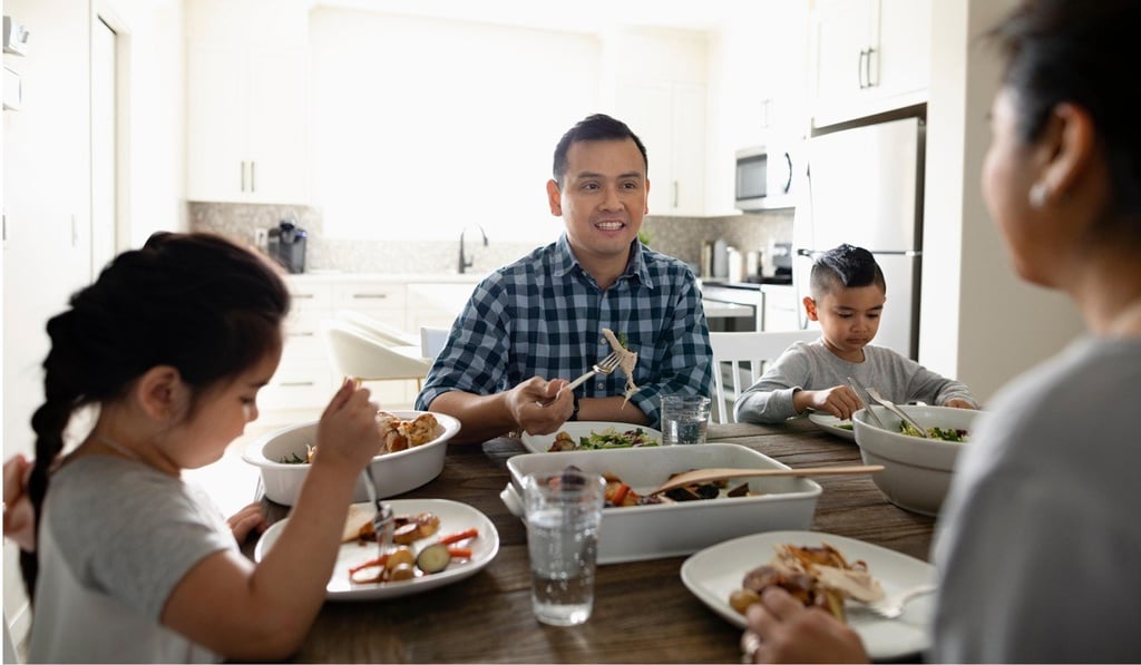 Try not to comment on what your kids do and don’t eat at the dining table. Photo: Alamy