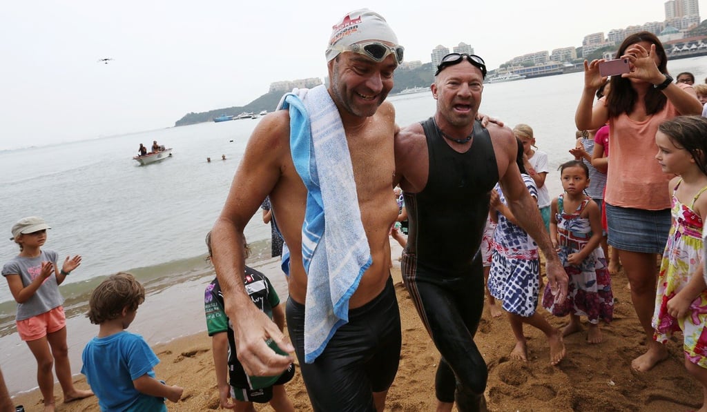 Olivier Baillet (left) and Bruce Pye in Discovery Bay after the 75km Round Lantau Island Swim Challenge. Hong Kong’s open waters and many trails make it prime territory for Swimrun. Photo: SCMP