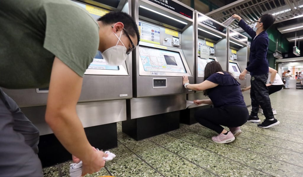 Volunteers clean up at MTR Kwai Fong Station, where riot police fired tear gas. Photo: K.Y. Cheng