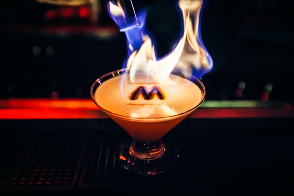 A flaming cocktail served at The Berlin bar in Kuala Lumpur A flaming cocktail served at The Berlin bar in Kuala Lumpur
