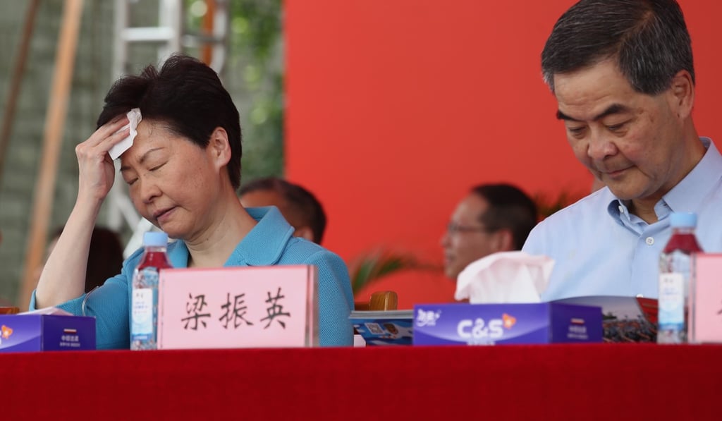 Hong Kong Chief Executive Carrie Lam Cheng Yuet-ngor and former chief executive Leung Chun-ying at an event at the Hong Kong Youth Military Summer Camp. Photo: Nora Tam